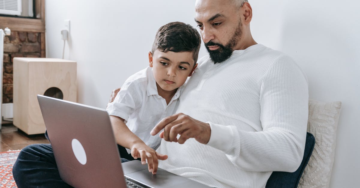 Father and Son Sitting on the Floor